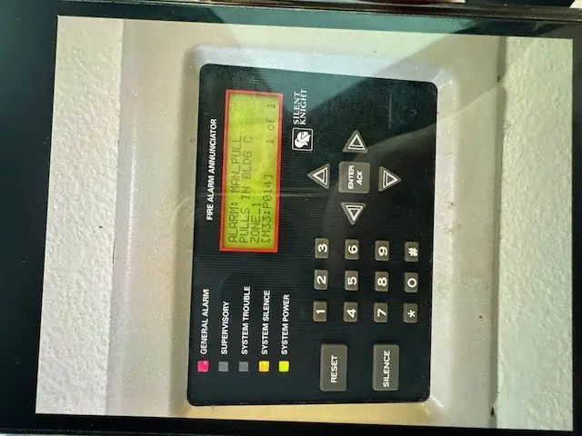 Silent Knight fire alarm annunciator showing a manual pull station alarm