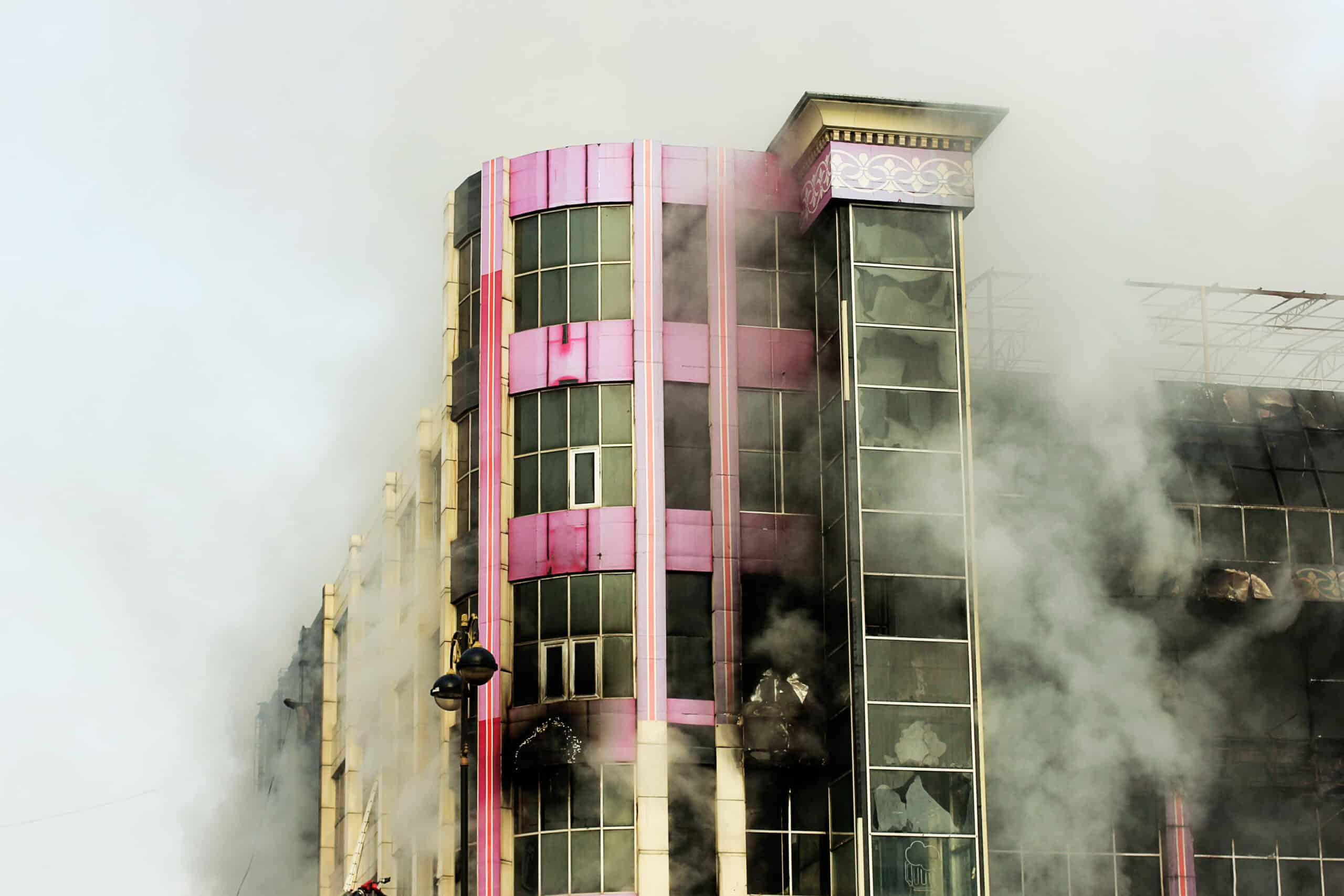 shopping center or mall fire,smoke,fighters,space for copy or te